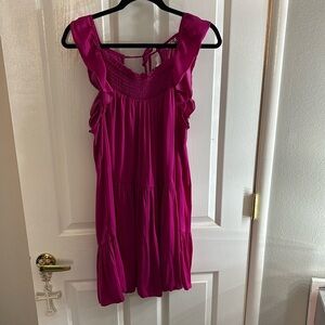 Cute ruffly magenta free people mini dress with cute open back detail